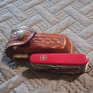 Victorinox Red Swiss Army Multi-Tool with Brown Leather Sheath